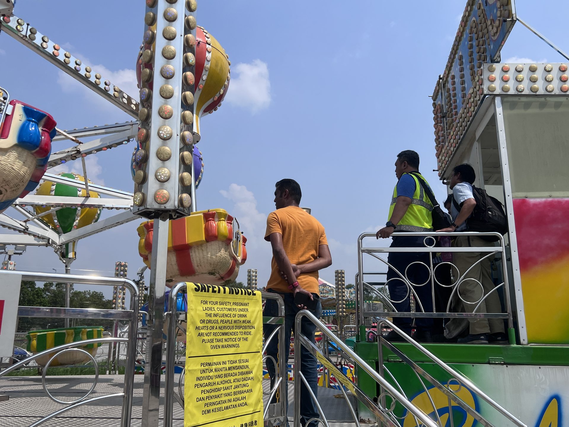 Inspection personnel checking kiddie ride area